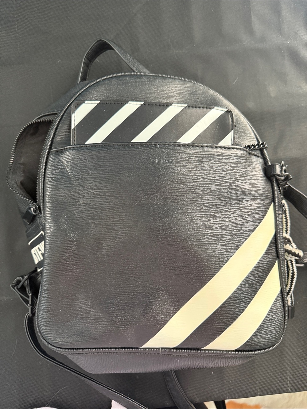 Aldo Black Mini Backpack with Cream Diagonal Stripes